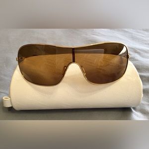 Women’s Oakley gold polarized sunglasses